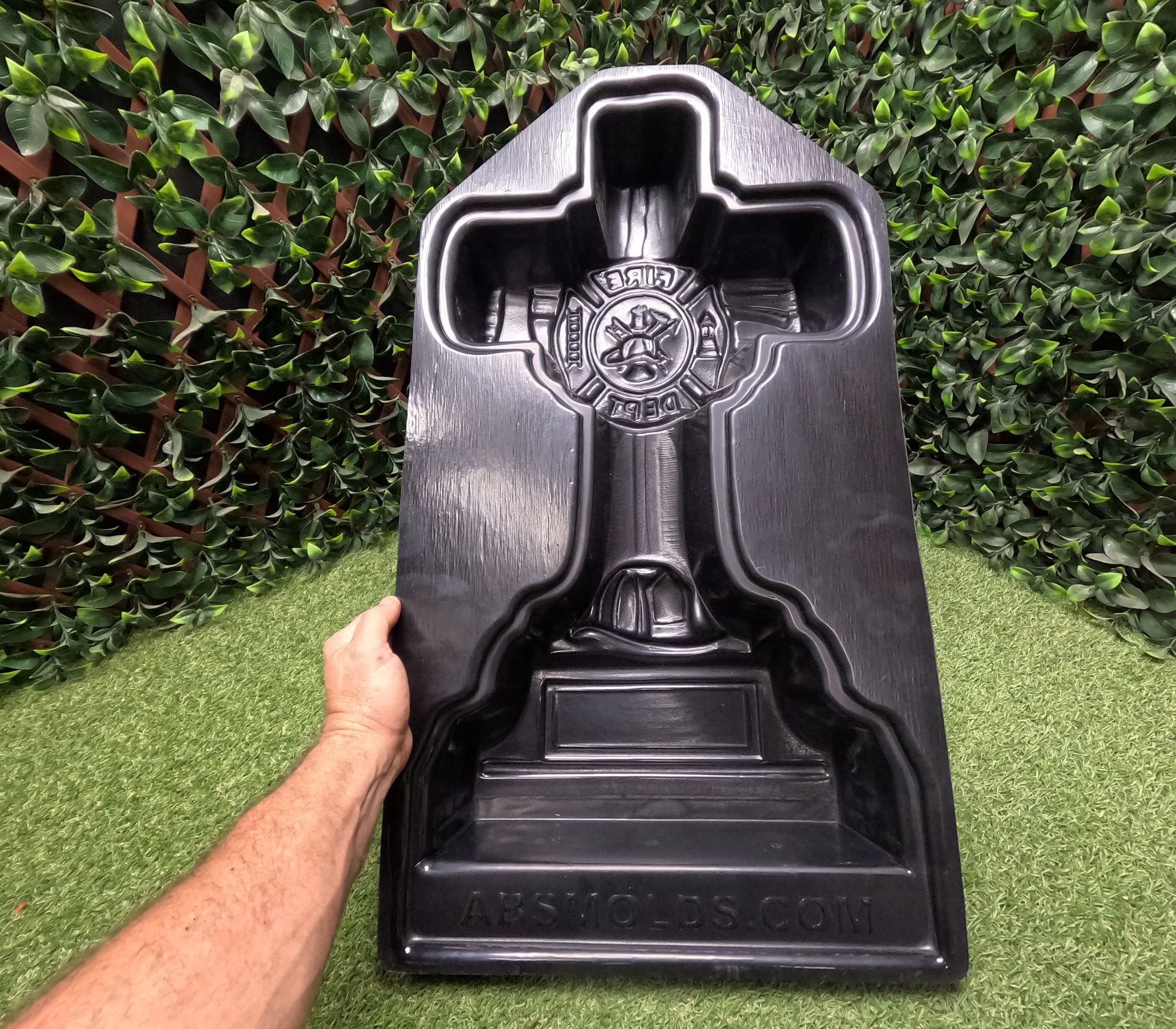 Front view of Fireman Cross concrete mold cavity