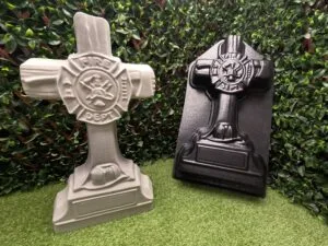 Fireman Cross concrete mold shown beside finished concrete memorial cross