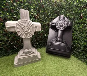 Fireman Cross concrete mold shown beside finished concrete memorial cross