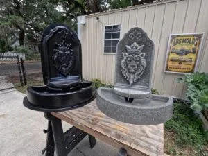 Kingswell Fountain Concrete Mold Set shown beside working finished fountain with flowing water