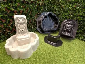 Unpainted Peewee Frog Fountain displayed beside the complete three-piece frog fountain mold set