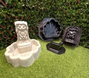 Unpainted Peewee Frog Fountain displayed beside the complete three-piece frog fountain mold set