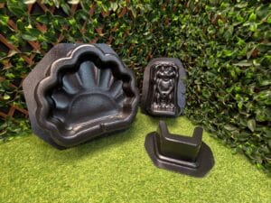 Rear view of the three-piece Peewee Frog Fountain mold set showing the bowl, frog topper, and riser molds.